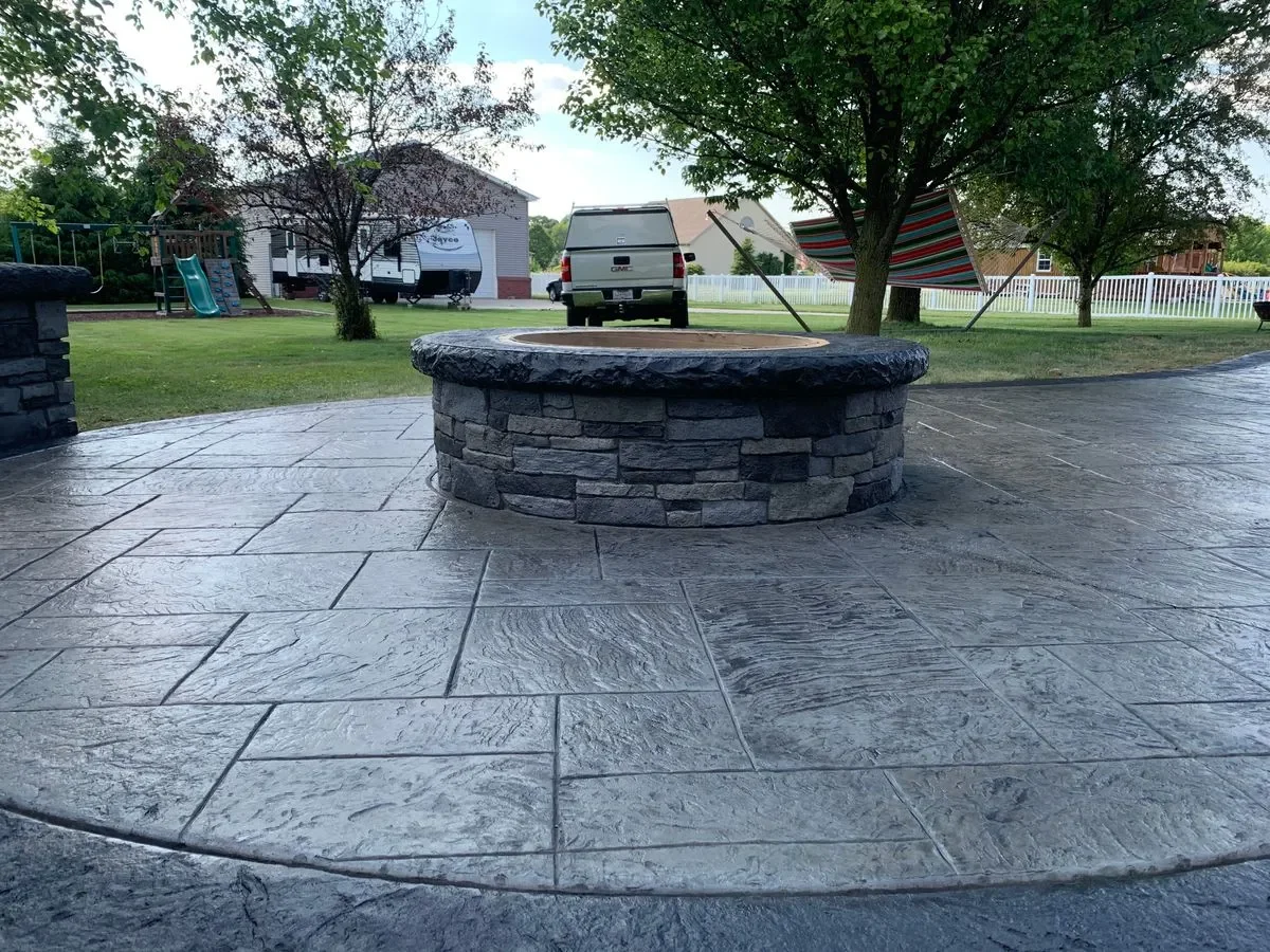 Multi-level stamped concrete with retaining wall