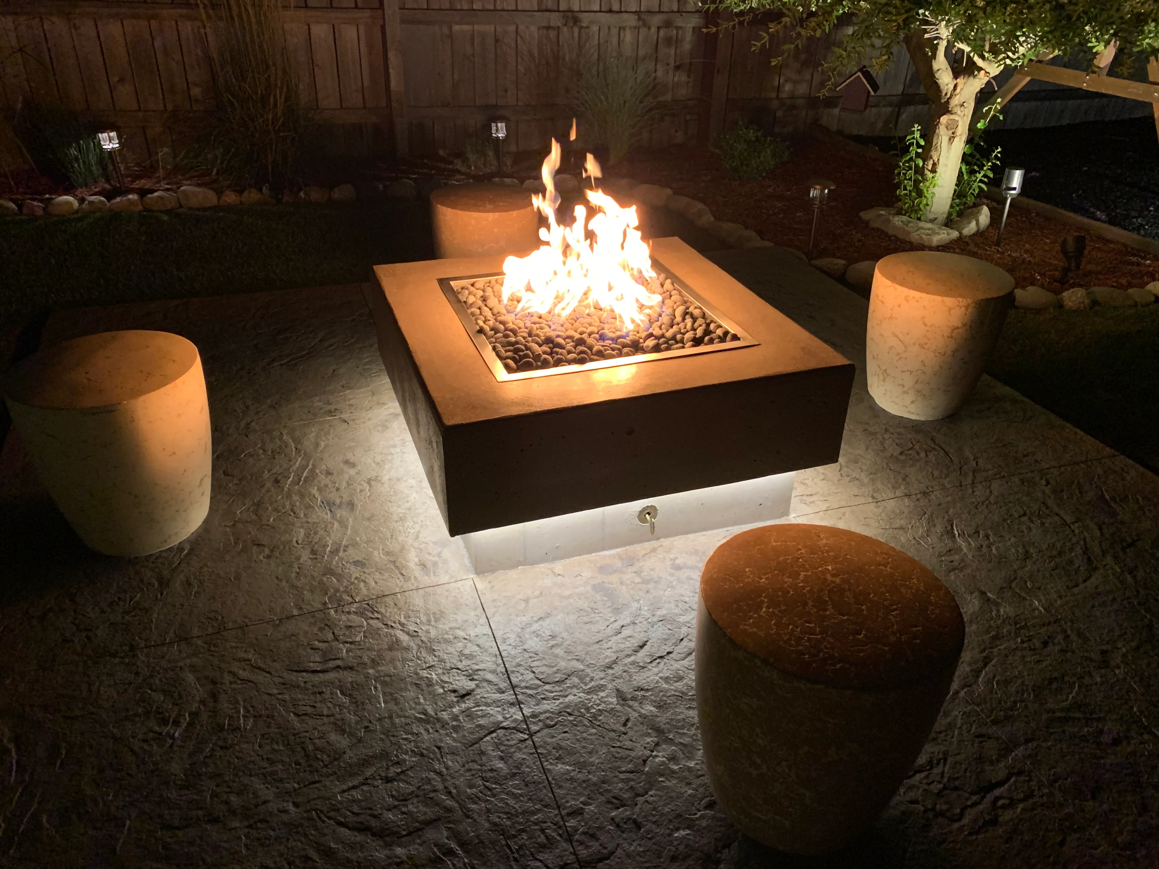 Large backyard patio with decorative border in Northwest Indiana