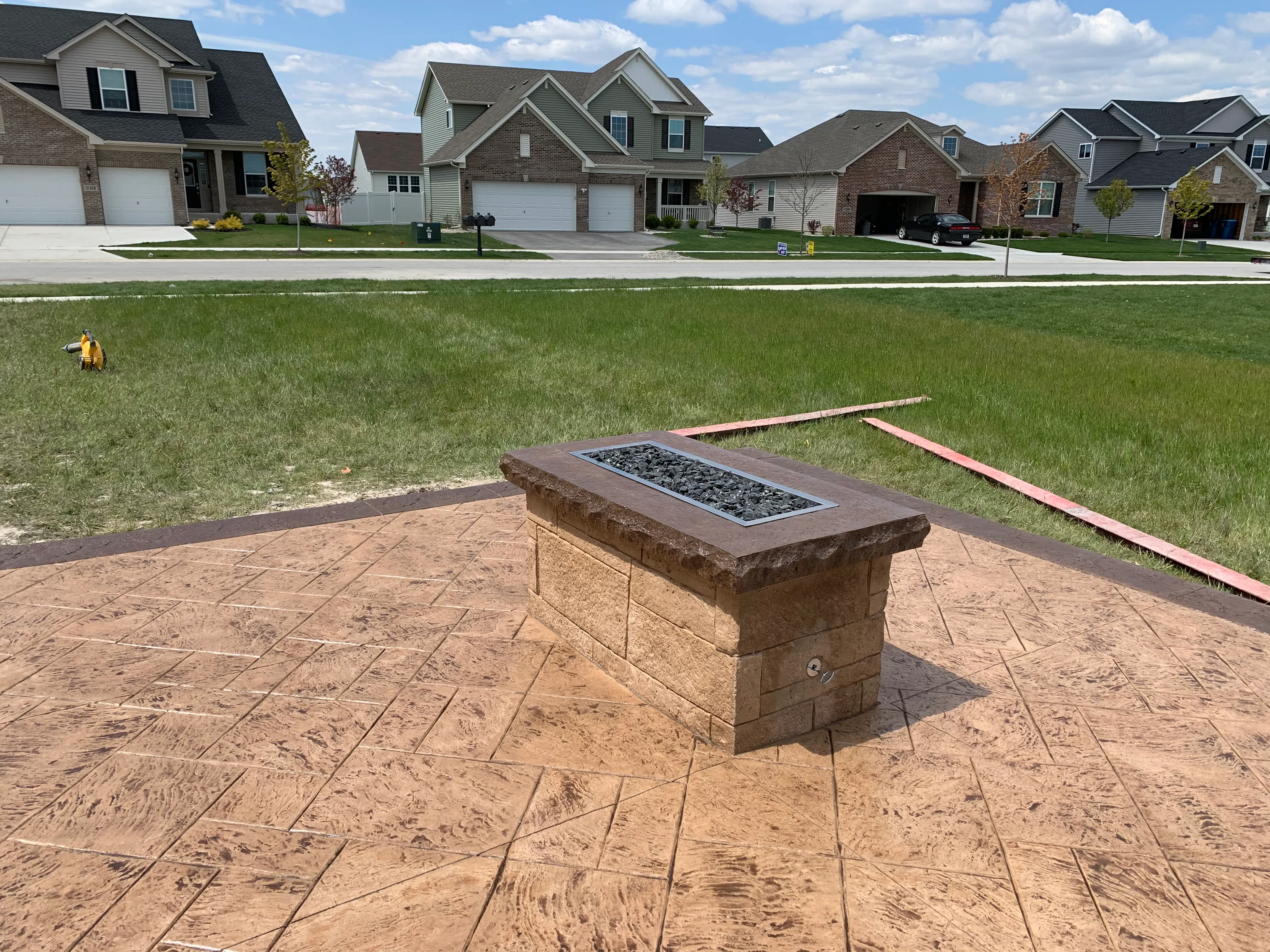 stamped concrete patio outdoor kitchen fire feature crown point indiana